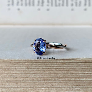 Tanzanite on Twisted Infinity 14k White & Rose Gold Ring