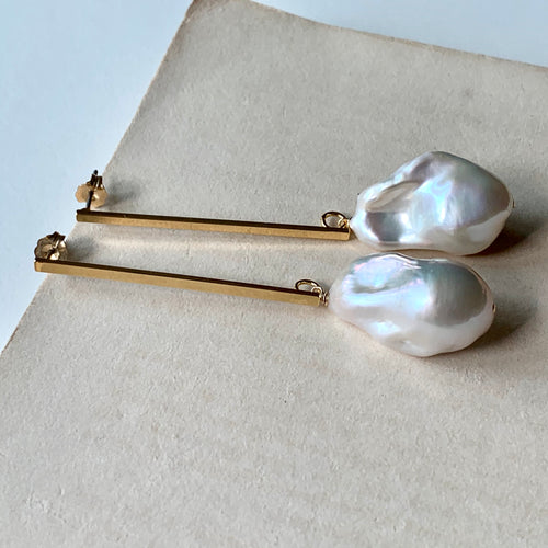 AAA Ivory Baroque Pearls on Long Bar Studs